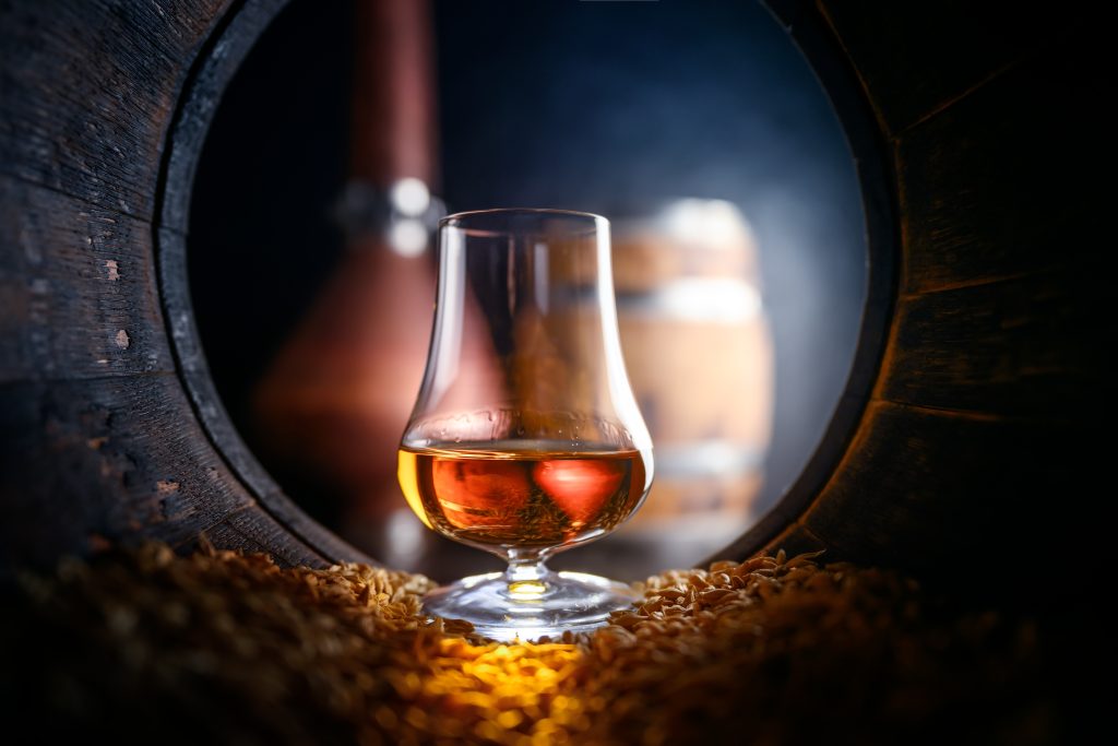 Whiskey tasting class inside an empty cask